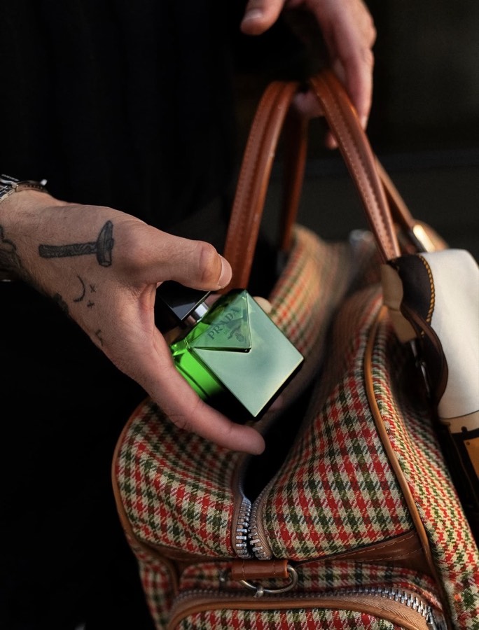 Prada fragrance in weekender bag